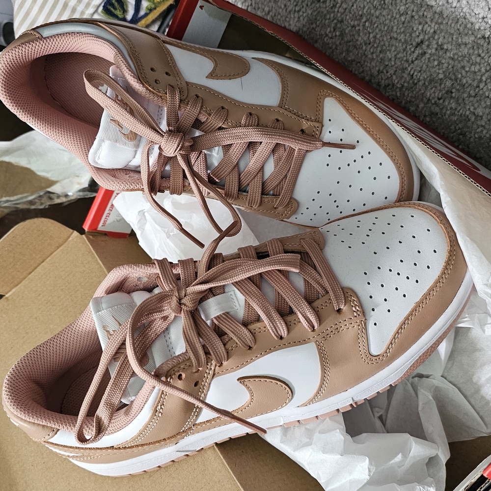 Nike Pink and White Sneakers with Classic Design